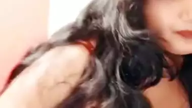 Sultry Desi bhabhi in red lingerie plays with her XXX breasts on cam