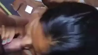 Cute girlfriend in bra giving blowjob to boyfriend