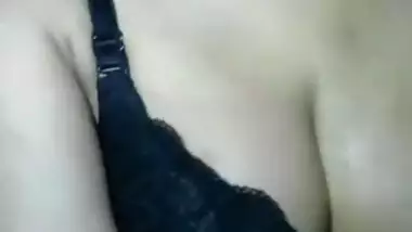 desi horny girl spittingon her boob and squuezing them