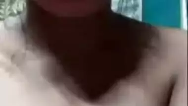 Smiling beautiful girl topless on video call