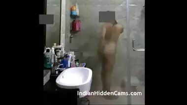 Desi babe taking shower in the hotel bathroom